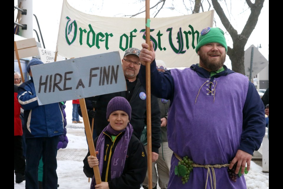 Adam Nousiainen leads the St. Urho Day parade as the legendary Finnish Saint. 
