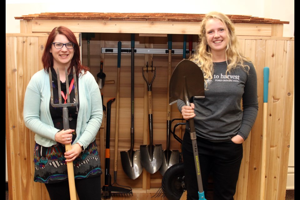 Ruth Hamlin-Douglas of with the Thunder Bay Public Library and Alia Wurdemann-Stam of Roots to Harvest, offocially opened the Garden Tool Lending Library program at the Brodie Street Library. 