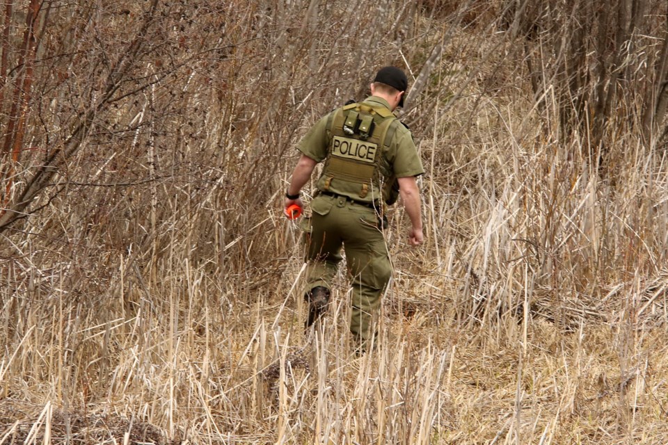 Thunder Bay Police conduct a ground search along the Neebing McIntyre Floodway, an attempt to locate missing 14-year-old Josiah Begg (Leith Dunick, tbnewswatch.com). 