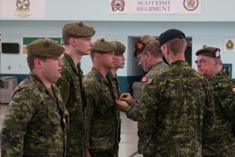 Cpl. Andrew Biscardi, Cpl. Gabriel Green, Cpl. Allan Faykes, and Cpl. Ben Deley received their Special Service Medals from Lt. Col. David Ratz during a ceremony on Sunday.   Master Cpl. Billy McElroy also received the Special Service Medal but is away on training. 