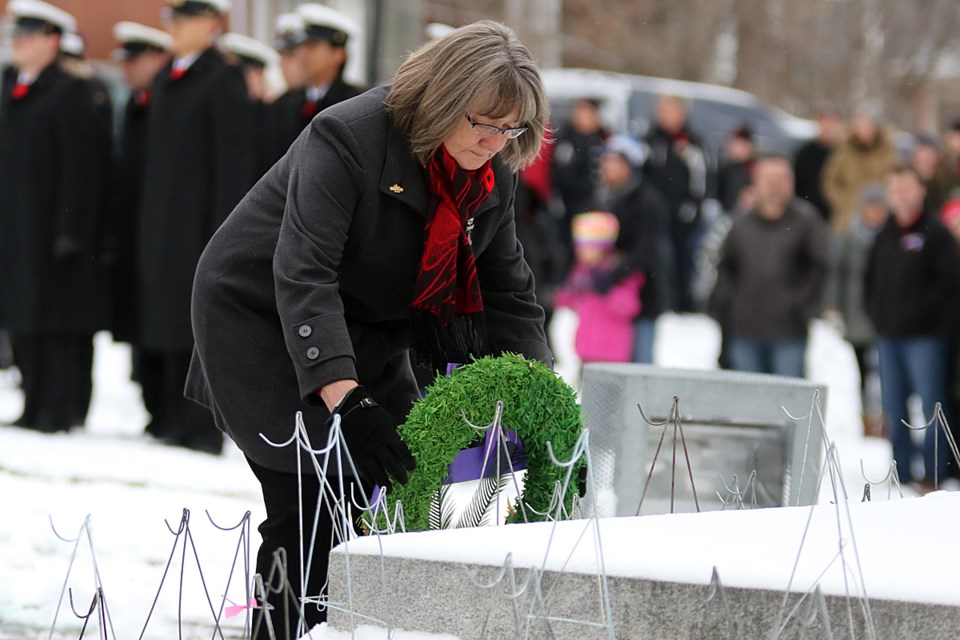 Silver Cross Mother Carol Klukie lays a wreath on Saturday, Nov. 11, 2017 at the Waverley Park cenotaph in honour of her son Josh, who was killed in Afghanistan in 2006 (Leith Dunick, tbnewswatch.com). 