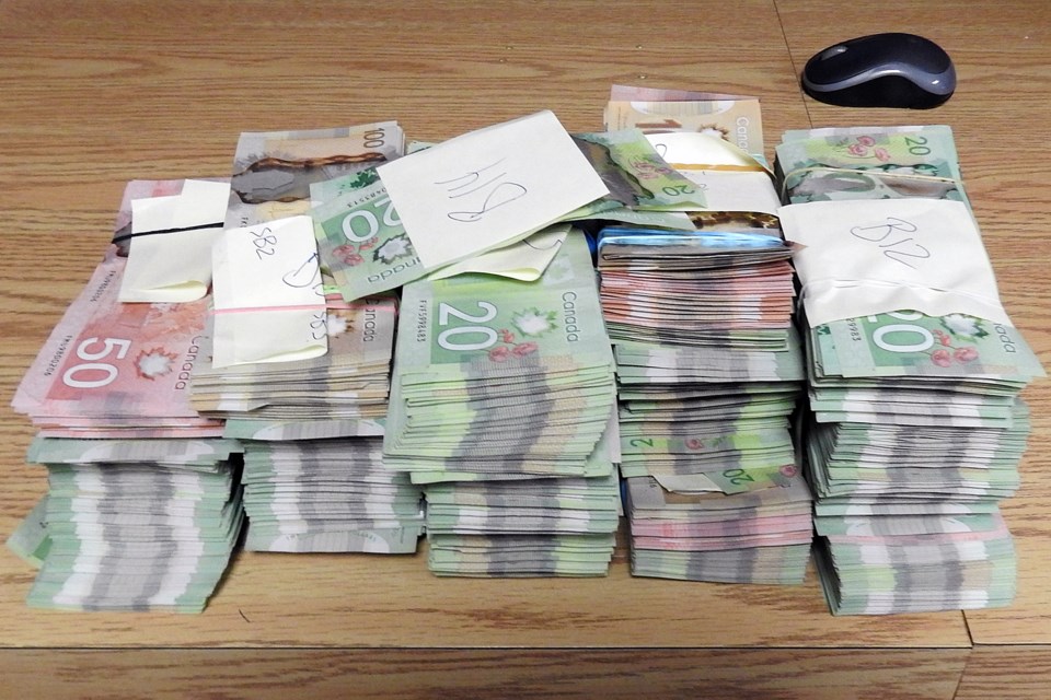 Police seized $123,000 in cash at a Shuniah, Ont. residence on Wednesday, Oct. 18, 2017 (Thunder Bay Police photo). 