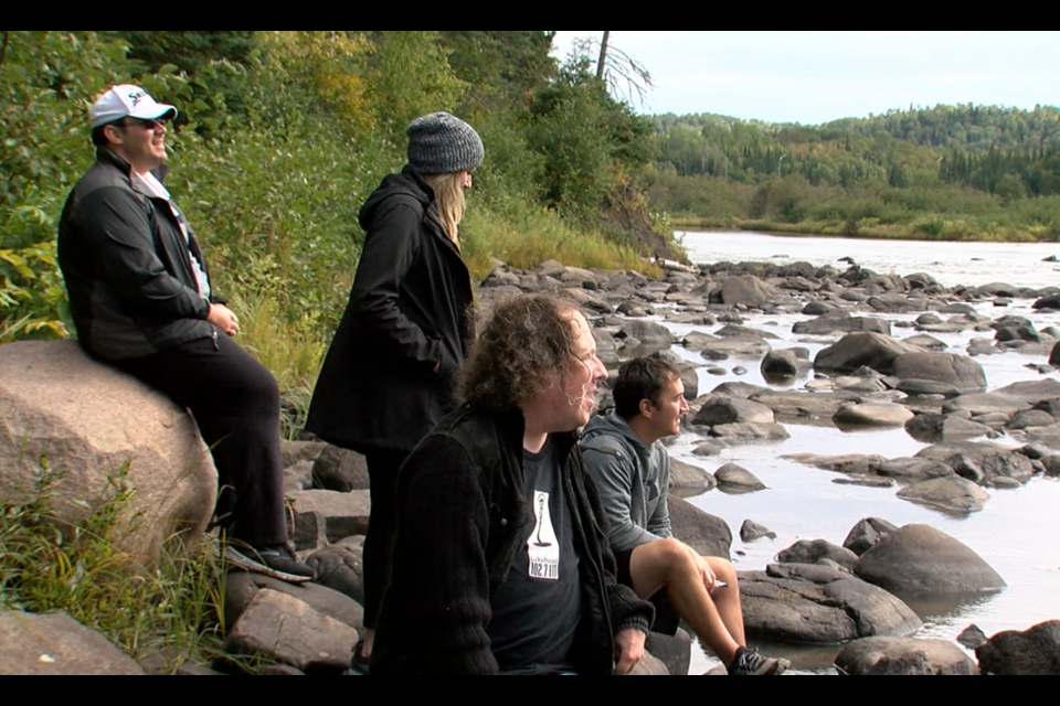 Ryan Trush (foreground) and other Thunder Bay residents greeted their American buddy Cody Esser across the Pigeon River on Sept. 19, 2020 (Jonathan Wilson/TBTV photo)