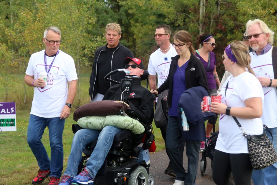 Murray Brown finishes the 15th Annual Walk for ALS along with Team Brown at Boulevard Lake. (Photos by Doug Diaczuk - Tbnewswatch.com). 