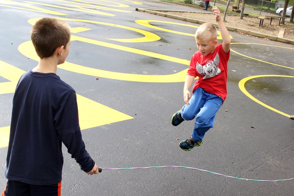 Rylan Dawson, 6, jumps rope on Wednesday, Sept. 20, 2017 at Odgen Community School (Leith Dunick, tbnewswatch.com). 
