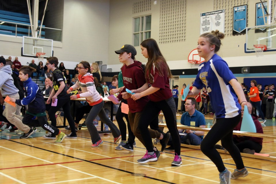 Local students sprint off the line during the math relay, one of several events at this year's Math Olympics. (Photos by Doug Diaczuk - Tbnewswatch.com). 