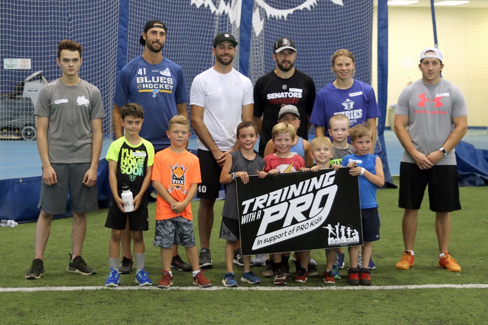 Robert Bortuzzo, Carter Hutton, Tom Pyatt and Amanda Makela spent a couple of hours on Wednesday, Aug. 22, 2018 at the Hangar teaching local youngsters at the Training With A Pro event in support of PRO Kids. (Leith Dunick, tbnewswatch.com)