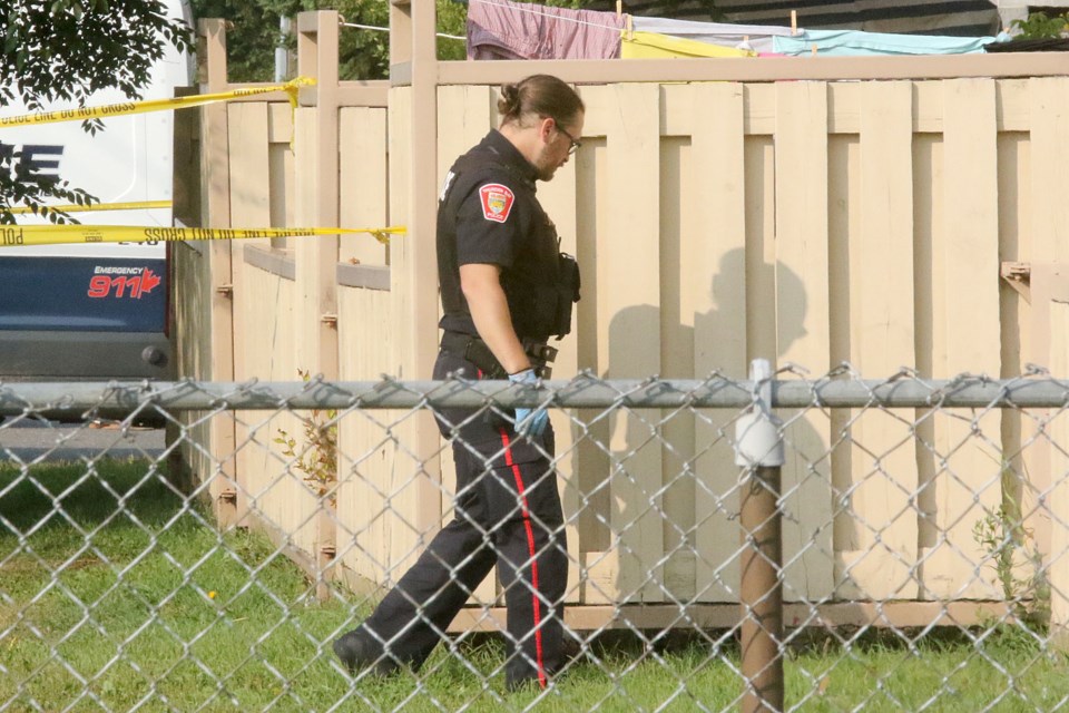 Thunder Bay Police on Monday, Aug. 13 investigate reports of shots fired in the Windsor Street area earlier that day. (Leith Dunick, tbnewswatch.com)