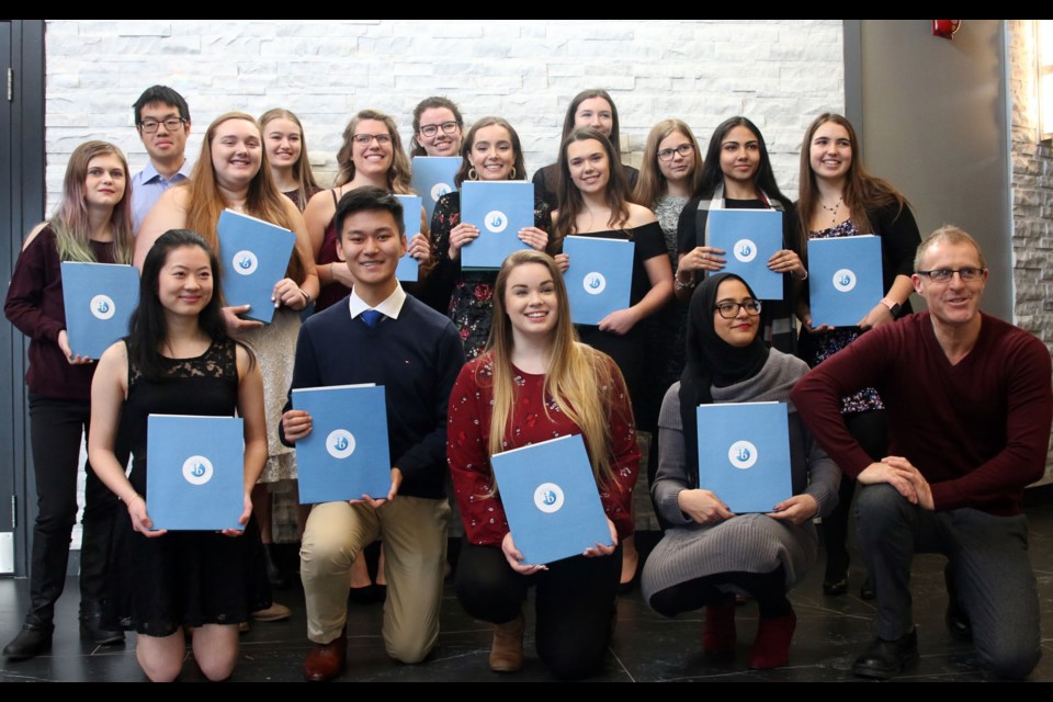 International Baccalaureate Programme graduates celebrate their success in a ceremony on Saturday. (Photos by Doug Diaczuk - Tbnewswatch.com). 