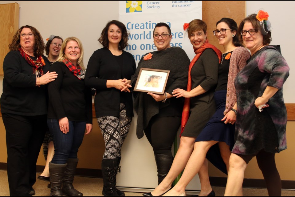 From left to right: Debra Sneve, Sherry Vita, Angela Woods, Jacquie Kennedy, Jackie Ruberto,  Nicole Shaw, Jasmine Petch, and Joanne Ruberto participated in the 5th annual Jan-U-Hairy fundraiser, collecting more than $6,100 for brain cancer research. 