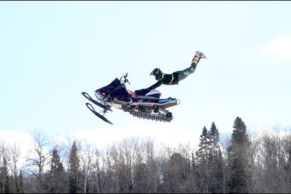 X-Games competitor, Josh Penner, defies gravity during the snowmobile stunt show at the Fort William Historical Park Winter Carnival on Saturday. (Photos by Doug Diaczuk - Tbnewswatch.com). 