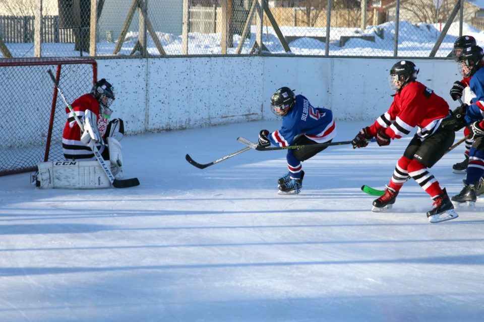 The Westfort Rangers took on the Elks Blackhawks in an outdoor Winter Classic game on Saturday at the West Thunder Community Centre outdoor rink. (Photos by Doug Diaczuk - Tbnewswatch.com). 