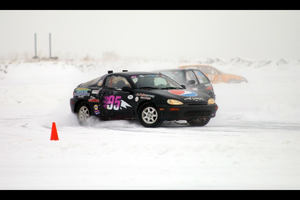 Driver Amber Kelly, 18, fights for position around a tough corner during the first race of the Thunder Bay Autosports Club Ice Racing season on Sunday at Mission Bay. (Photos by Doug Diaczuk - Tbnewswatch.com). 