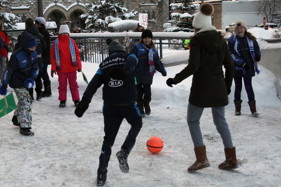 Children play soccer in front of Thunder Bay city hall before the council meeting on Monday, January 15, 2018. (Matt Vis, tbnewswatch.com)