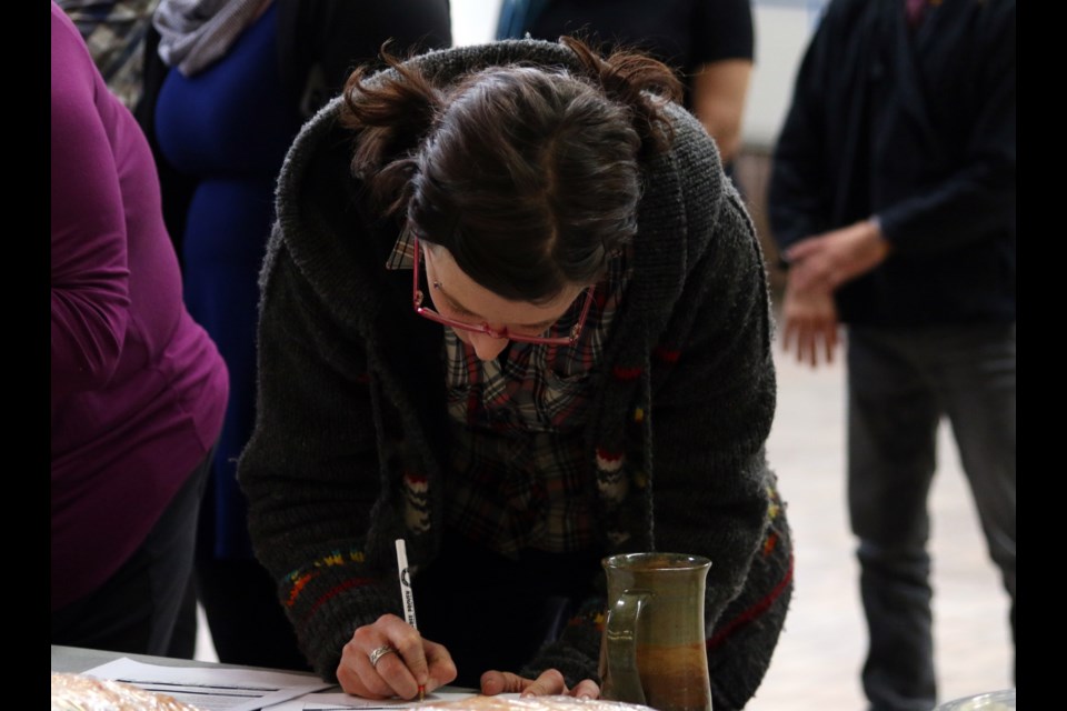 Students and staff at Lakehead University were invited to sign a petition calling for Senator Lynn Beyak's resignation. Staff member, Keri Pidgen, signed on Wednesday, saying the community needs to support each other and help Indigenous people heal. 