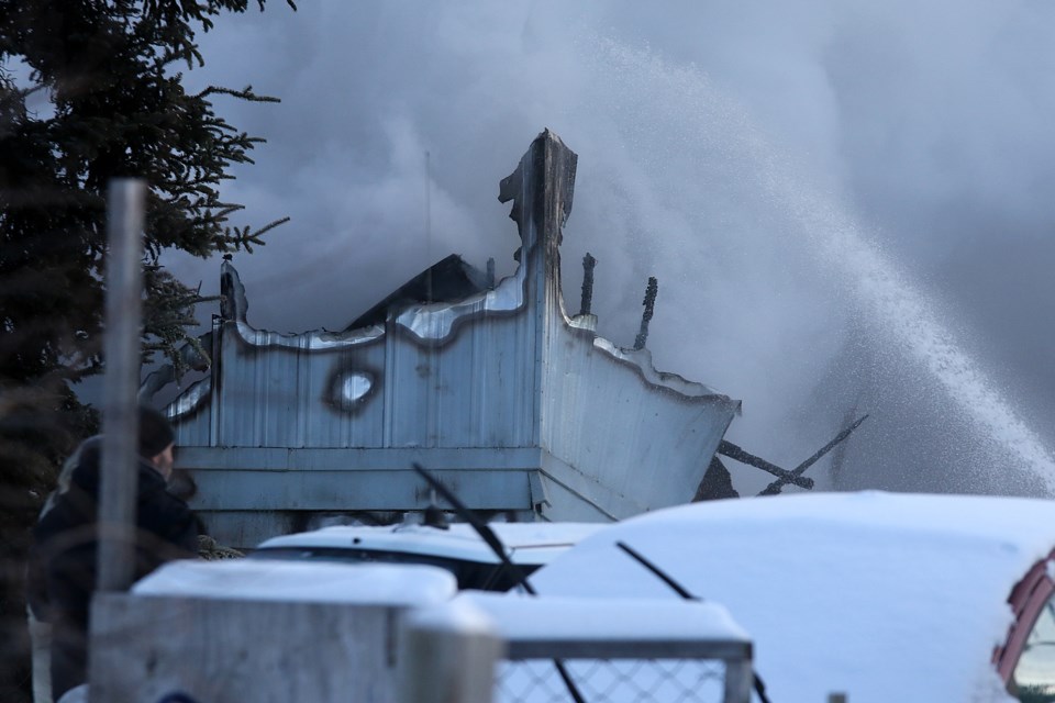 Little remains of a trailer engulfed by fire on the morning of Thursday, Jan. 4, 2017 at a trailer park off Silver Springs Road. (Leith Dunick, tbnewswatch.com)