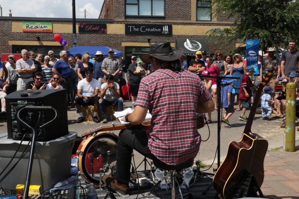 Japanese-Australian artist George Kamikawa captivated an audience at Busker's Festival on Saturday, July 28, 2018.