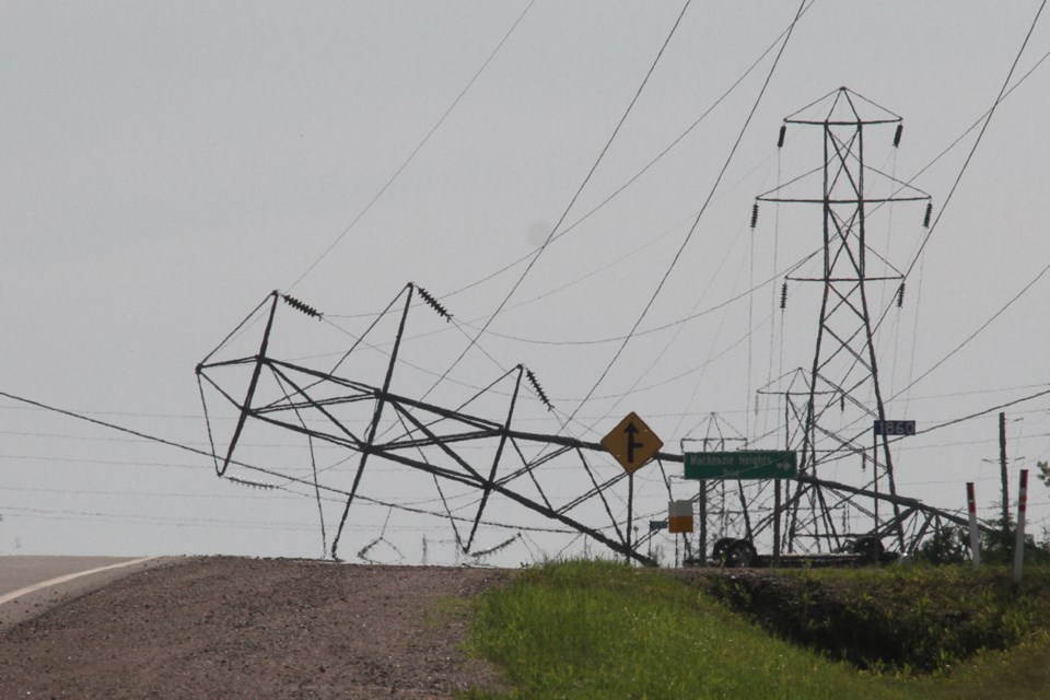 A pickup truck collided with a hydro tower on Lakeshore Drive on Tuesday, July 3, 2018. (Michael Charlebois / tbnewswatch)