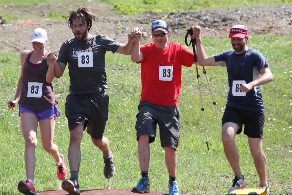 A group of competitors cross the finish line at the Matterhorn Madness at Mount Baldy on Saturday, July 7, 2018. (Michael Charlebois, tbnewswatch)