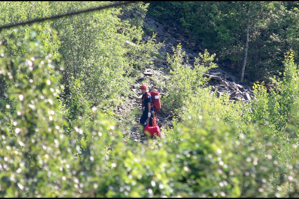 Thunder Bay Fire Rescue crews had a tricky climb up a shale trench to rescue two women who became trapped Tuesday afternoon. (Photos by Doug Diaczuk - Tbnewswatch.com). 