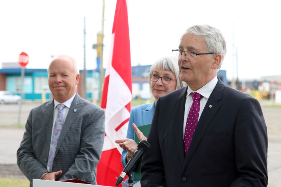 Minister of Transportation, Marc Garneau, along with Minister Patty Hajdu and Thunder Bay Port Authority CEO, Tim Heney, announced a $7.5 million investment into infrastructure projects at the Port of Thunder Bay. (Photo by Doug Diaczuk - Tbnewswatch.com). 
