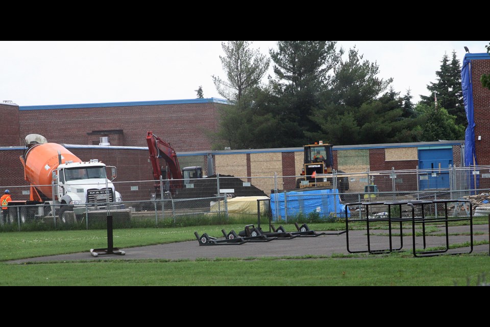 Construction crews work on an expansion to Westgate Collegiate and Vocational Institute on Tuesday, July 3, 2018. (Matt Vis, tbnewswatch.com)