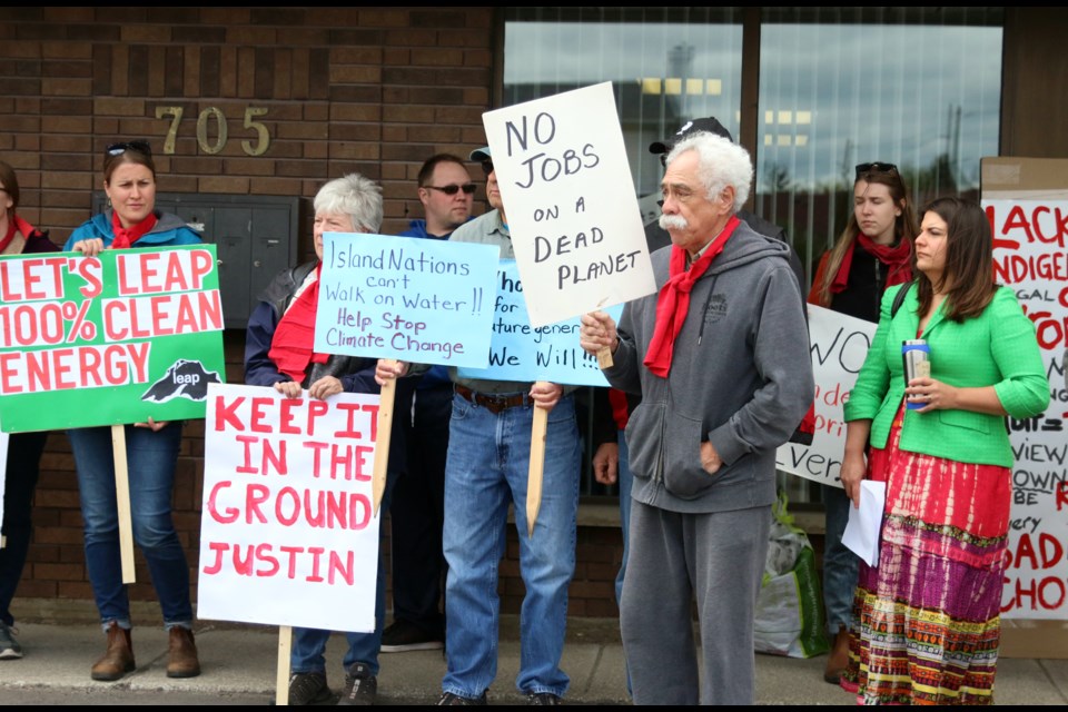Nearly 40 people gathered outside Minister Patty Hajdu's office to protest the federal government's purchase of the Trans Mountain Pipeline. (Photos by Doug Diaczuk). 
