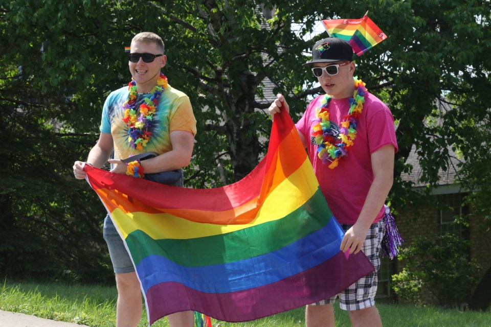 Cameron Yilmaki (left) and Matthew Koski at the sixth annual Thunder Bay Pride Parade. (Michael Charlebois, tbnewswatch)