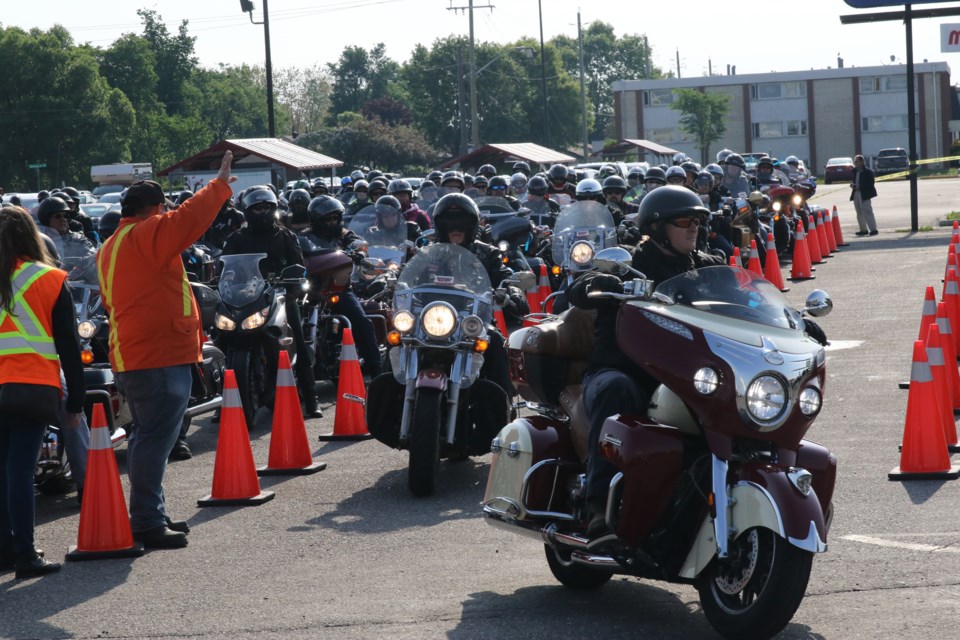 About 100 bikes let out a booming roar when they revved their engines to kick off this year's Motorcycle Ride For Dad. (Michael Charlebois / tbnewswatch)
