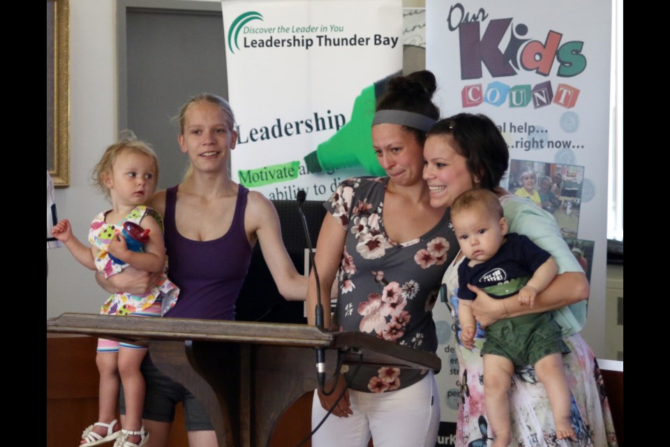 Brooklyn Chlebovec (centre) along with Jordan (right) and Amanda help launch the Our Kids Count video to end the stigma facing young parents. (Photo by Doug Diaczuk - Tbnewswatch.com). 
