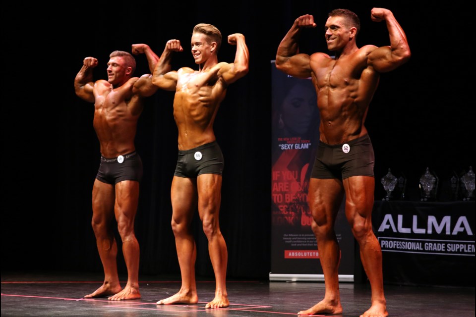 Andre Vaillant (far right), William Agnew (middle), and Devon Noel were three of 27 bodybuilders competing in the Thunder Bay Bodybuilding Championships on Saturday. 