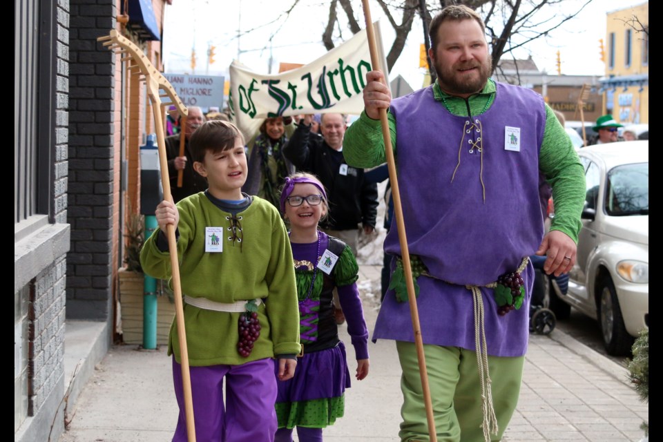 Adam Nousiainen takes on the role of Saint Urho for the third year and leads the parade on Saturday with his son, Jukka and daugher, Essi. (Photos by Doug Diaczuk - Tbnewswatch.com). 