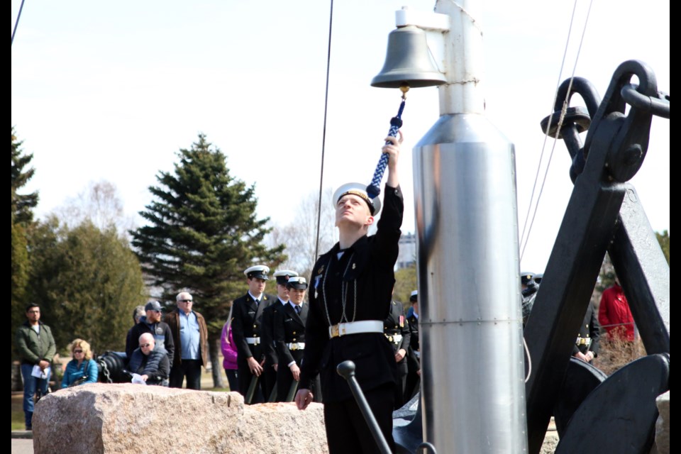 In a ceremony on Sunday, 42 Vindictive sea cadet chief petty officer, Joshua Grasley, rings the bell for every ship lost during the Battle of the Atlantic. (Photos by Doug Diaczuk - Tbnewswatch.com).  