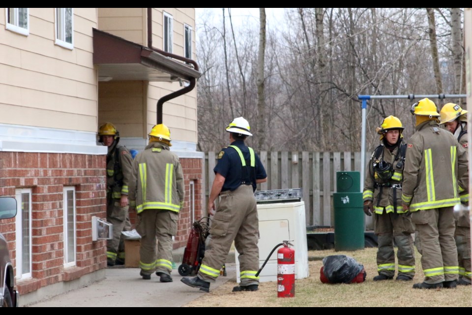 Thunder Bay Fire Rescue crews removed a dryer that caused a minor fire at a Frederica Street apartment building Wednesday afternoon. (Photos by Doug Diaczuk - Tbnewswatch.com). 