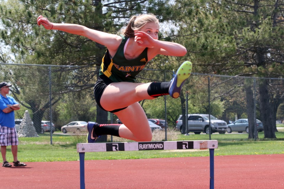 Jocelyn Ertl of St. Patrick High School participates in five track events including 100-metre hurdles.  (Michael Charlebois, tbnewswatch)