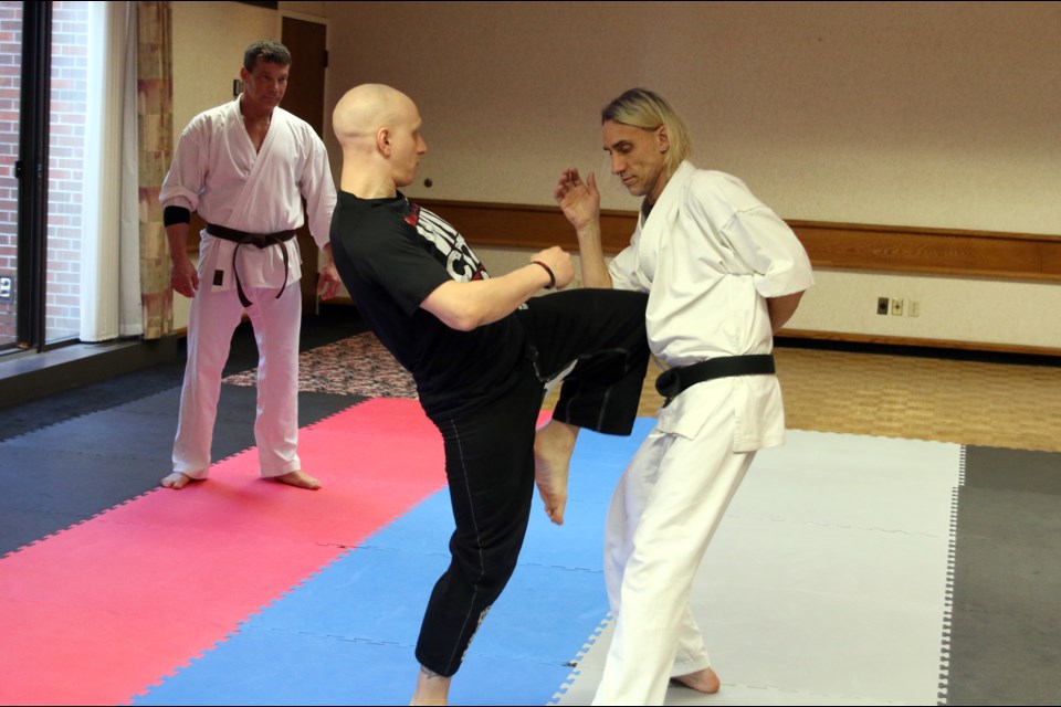 Chucky Mady, a fourth degree black belt, demonstrates a move during a seminar at the Isshinryu Karate Expo held this past weekend. (Photos by Doug Diaczuk - Tbnewswatch.com). 