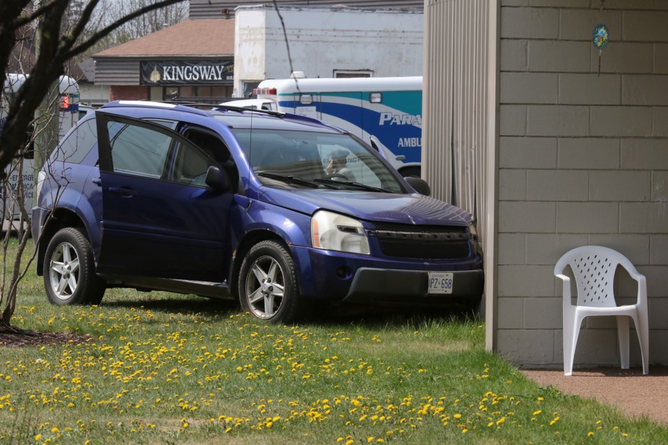 A driver struck three parked vehicles on Wednesday, May 23, 2018 before hitting a Kingsway apartment complex. The driver was taken to hospital with unspecified medical issues. (Leith Dunick, tbnewswatch.com)