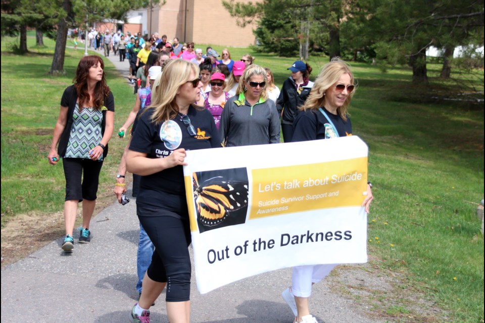 More than 100 people took part in the annual Out of the Darkness walk on Sunday, remembering those lost to suicide and creating a conversation about suicide prevention. (Photos by Doug Diaczuk - Tbnewswatch.com). 