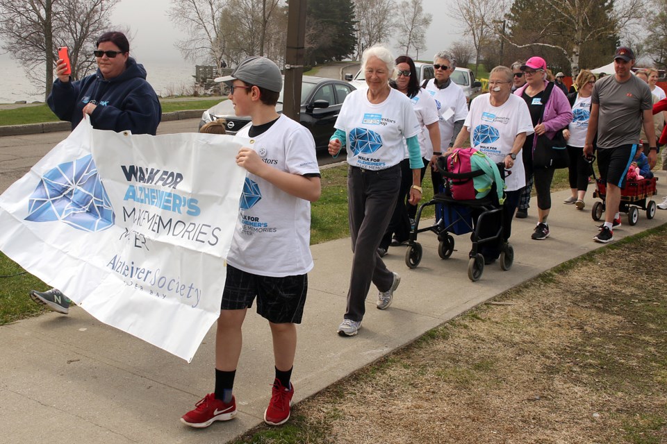 The family of Joyce Turk (third on the right) lead the way on Saturday, May 26, 2018 at the 24th annual Walk for Alzheimer's. 