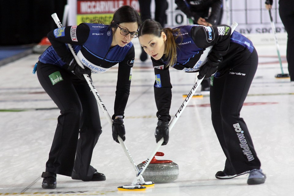 Ashley Sippala and Kendra Lilly sweep during Team McCarville's game against Team Scheidegger during the Pinty's Grand Slam of Curling Tour Challenge at the Thunder Bay Tournament Centre on Friday, November 9, 2018. (Matt Vis, tbnewswatch.com)