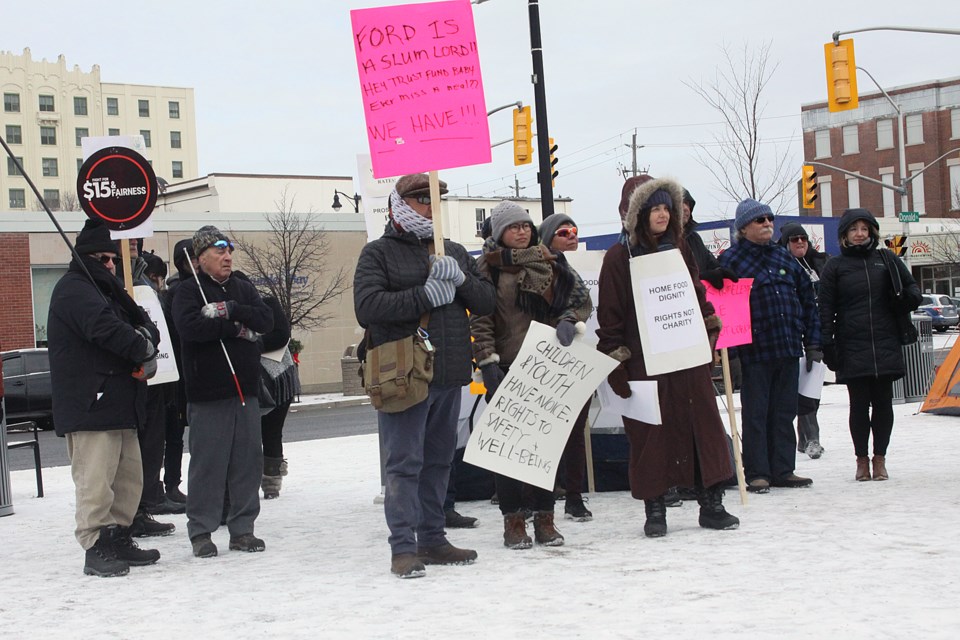 A demonstration was held outside Thunder Bay city hall on Tuesday, November 27, 2018 to speak out against social assistance policy changes made by the provincial government. (Matt Vis, tbnewswatch.com)