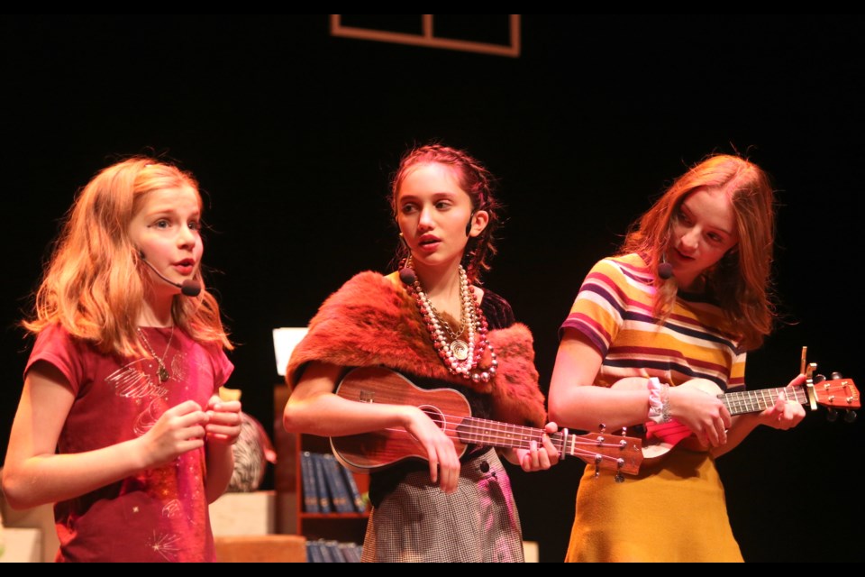 Rhys Pearson (left), Sofia Davey, and Sarah Hughes rehearse a scene from The Enchanted Bookshop that will be performed at the Thunder Bay Community Auditorium on Tuesday Nov. 27. (Photos by Doug Diaczuk - Tbnewswatch.com). 