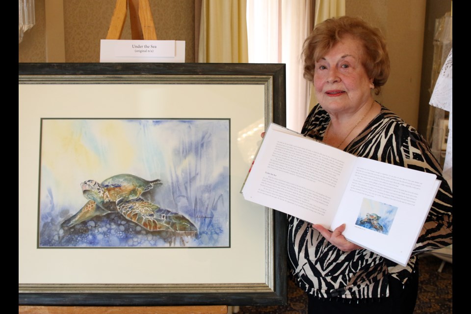 Kathleen Anderson held an exhibition this weekend to highlight her paintings and a new book In Paint and Prose. (Photos by Doug Diaczuk - Tbnewswatch.com). 