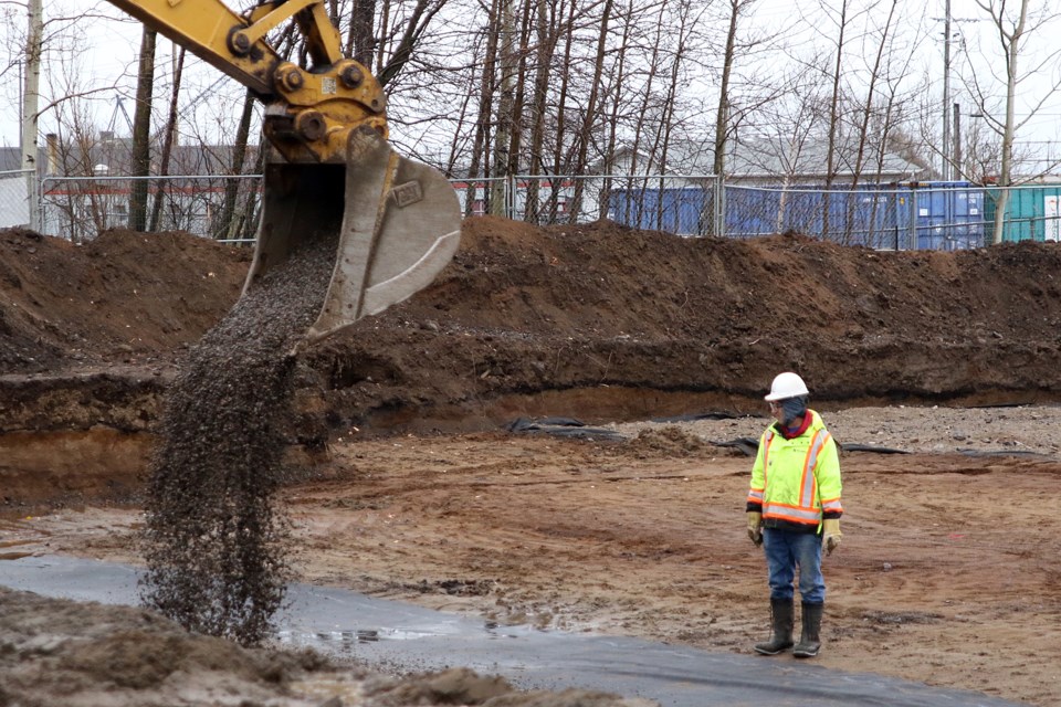 A construction worker awaits a load of gravel while conduction site-prep work for the Salvation Army's Journey to Life Centre on Friday, Oct. 26, 2018 on Cumberland Street. (Leith Dunick, tbnewswatch.com)