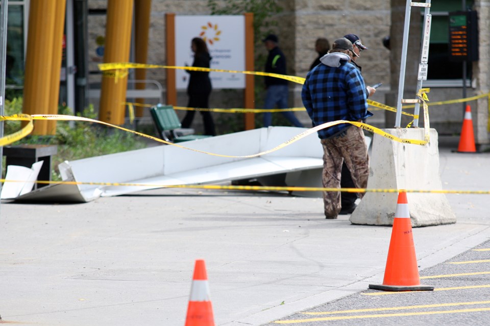 Large pieces of debris are seen outside the main entrance to the Thunder Bay Regional Health Sciences Centre. (Matt Vis, tbnewswatch.com)