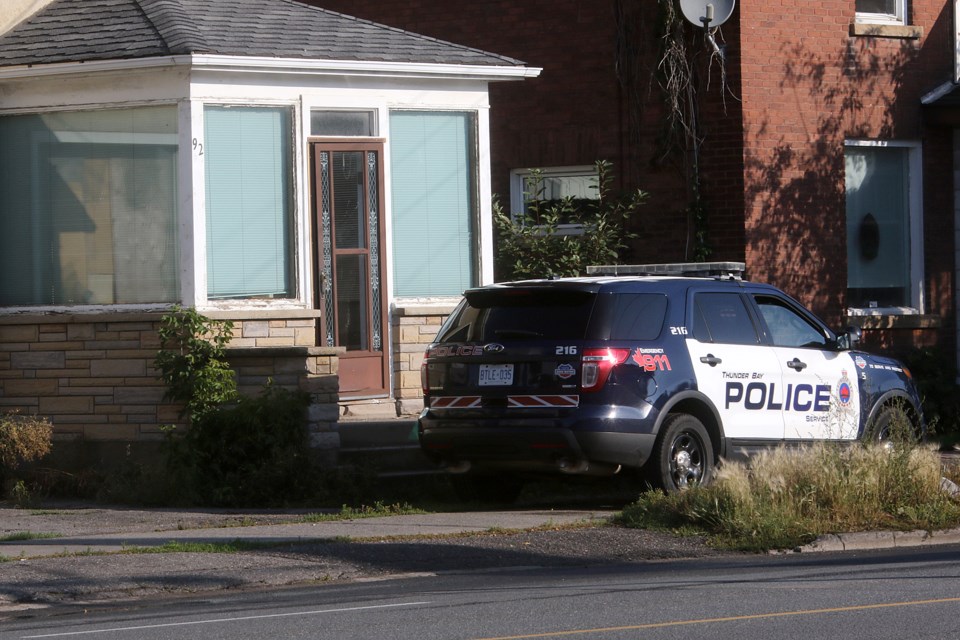 Thunder Bay Police on Saturday, Sept. 1, 2018 guard the scene at a North Algoma Street residence where a suspicious death occurred the day before. (Leith Dunick, tbnewswatch.com)