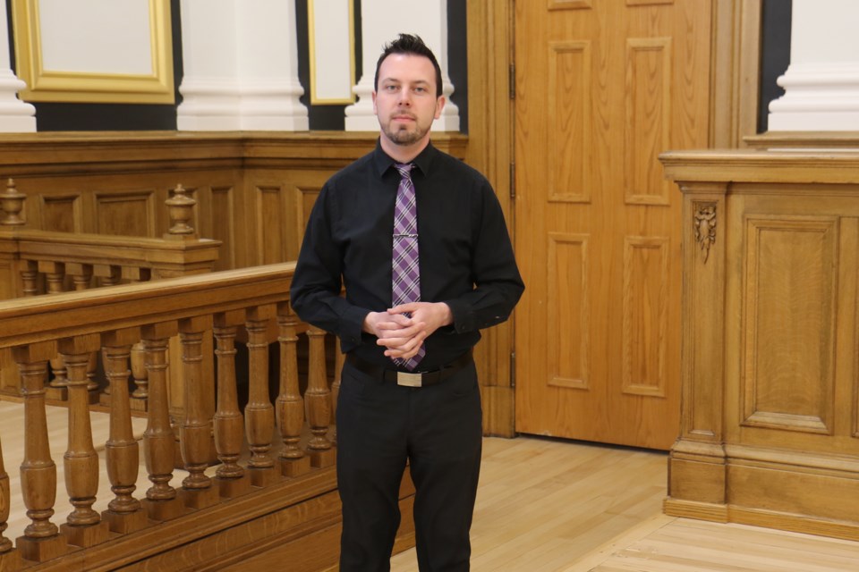 Thunder Bay Courthouse Hotel general manager Chris Kowbuz says the former courtroom has kept both the juror's box and the judge's table. (Leith Dunick, tbnewswatch.com