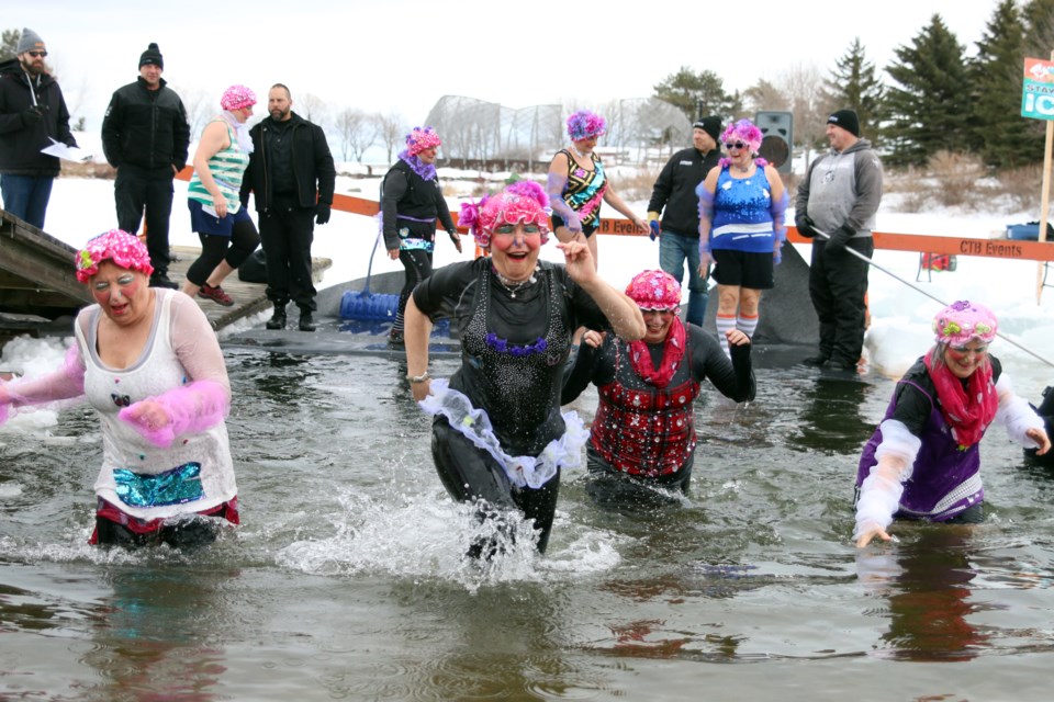 This year allowed plungers to run out of the water because the ice receded enough away from shore. 