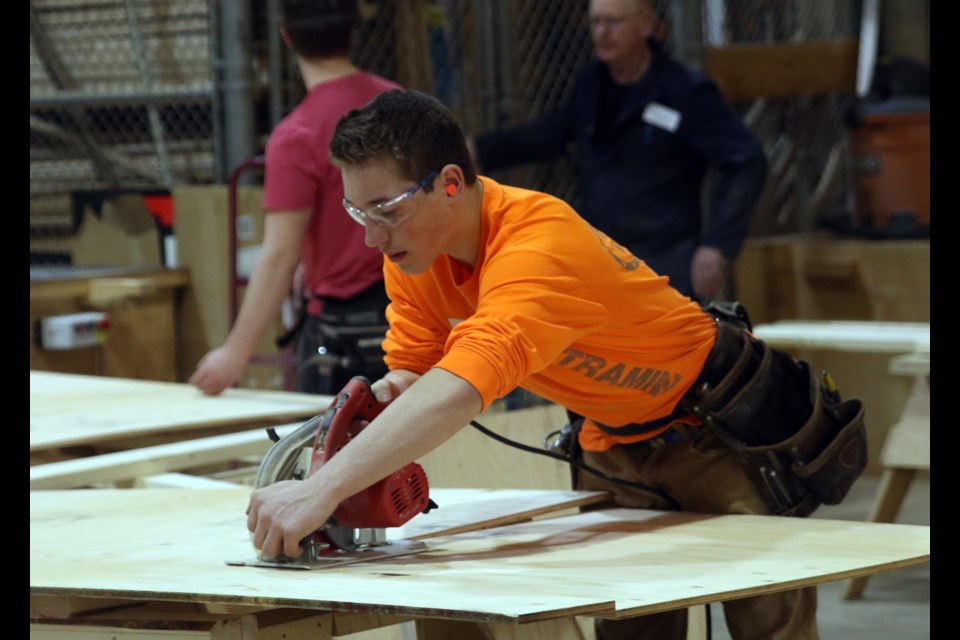 Atikokan High School student, Kelyn Vos, was hard at work during the carpentry competition at Confederation College on Saturday. (Photos by Doug Diaczuk - Tbnewswatch.com).  