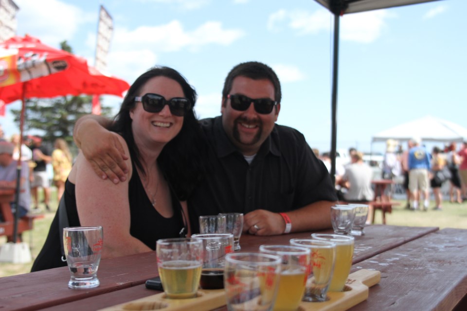 Sandra Reith (left) and Jeff Vandahal enjoying the Saturday session of BrewHa. (Michael Charlebois, tbnewswatch)